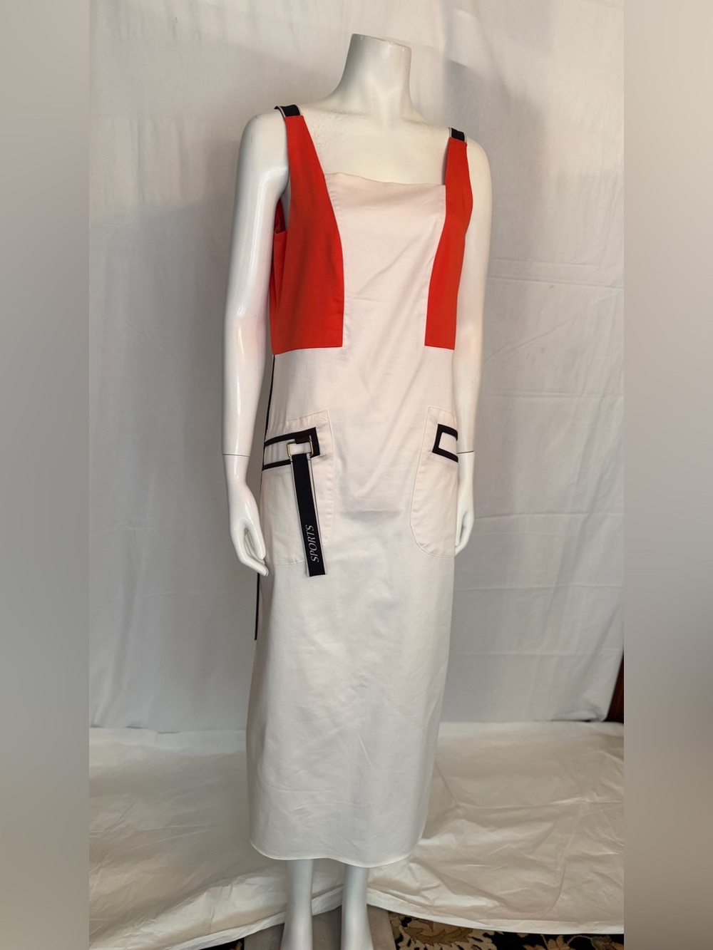 Sleeveless White Midi Dress with Red Accent